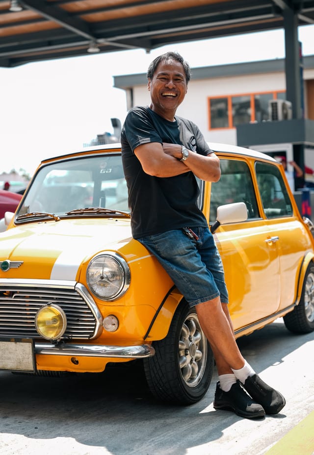 Pol Medina beside his car.